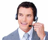 Confident young businessman using headset 