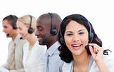 Attractive businesswoman and her team working in a call center