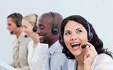 Animated businesswoman and her team working in a call center