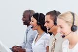 Enthusiastic business people working in a call center