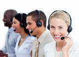 Blond businesswoman and her team working in a call center