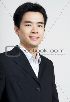 Handsome Asian executive