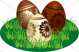 Decorated chocolate eggs in a stylized lawn
