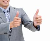 Close-up of a young businessman with thumbs up