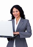 Smiling businesswoman using a laptop