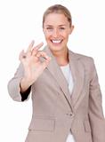 Positive businesswoman showing OK sign 