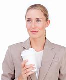 Attractive businesswoman drinking a coffee 