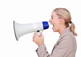 Attractive businesswoman holding a megaphone