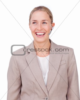 Portrait of a sparkling businesswoman with headset on 