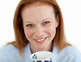 Close-up of a businesswoman drinking a cup of tea