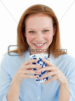 Young businesswoman holding a cup of coffee