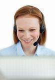 Attractive businesswoman with headset on 