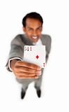 Successfull businessman holding all the aces 