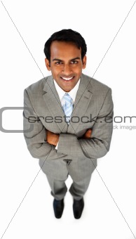 Ethnic businessman with folded arms 