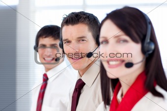 Young business people working in a call center