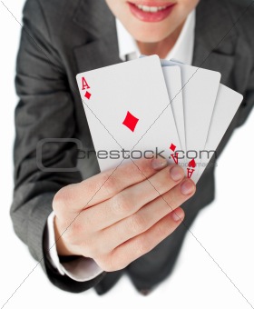 Close-up of a businesswoman holding all the aces 