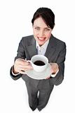 Confident businesswoman drinking a cup of coffee 