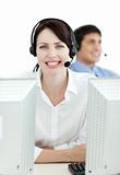 Businesswoman with headset on working