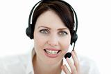 Close-up of an attractive businesswoman with headset on