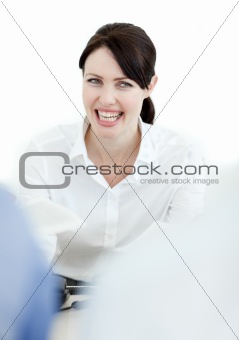 Young businesswoman against a white background