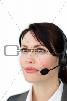 Self-assured businesswoman with headset