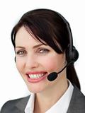 Assertive businesswoman with headset 