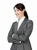 Radiant businesswoman with folded arms 