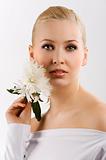 white woman whit flower
