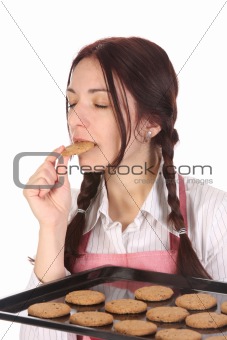 housewife eating a slice of chocolate cake 