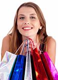 Woman holding lots of shopping bags in her hand