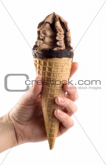 An ice cream in a hand is isolated
