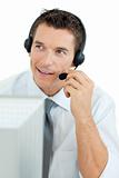 Smiling businessman with headset on 