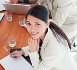 Charismatic Asian businesswoman in a meeting