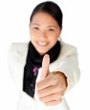 Confident Businesswoman with thumb up 