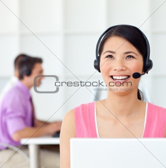 Laughing Customer service representative using headset 