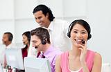 Multi-ethnic business people working in a call center