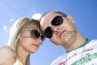couple against blue sky
