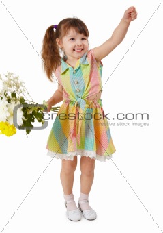 Cheerful child with bouquet of flowers