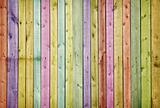 Wooden wall painted in colors of rainbow