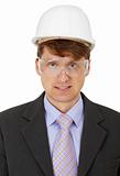 Engineer in protective helmet and goggles