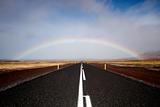Road and rainbow, low angle view