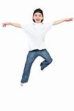 Little boy jumping on isolated white background