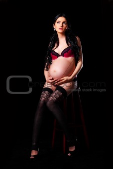 Beautiful pregnant woman in lingerie