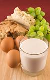 Fresh bread with eggs  and glass of milk