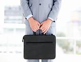 Mysterious businessman holding a briefcase