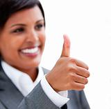 Happy businesswoman with a thumb up 