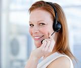 Smiling sales representative woman with an headset