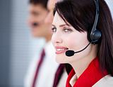 Concentrated sales representative team with an headset 