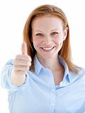 Self-assured business woman doing a thumb-up 