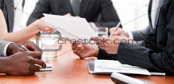 Close-up of multi-ethnic business people in a meeting